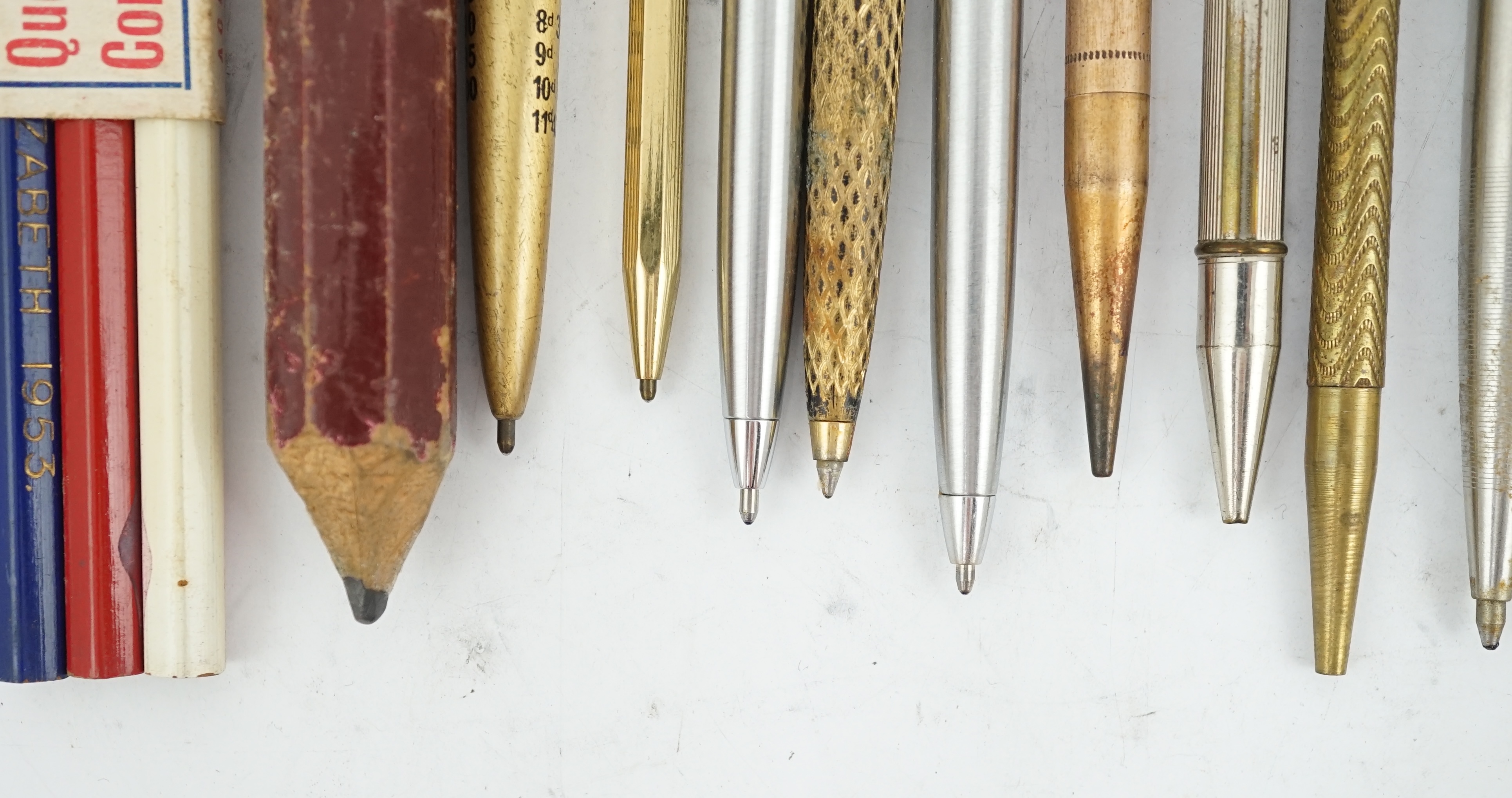 A collection of pens, pencils and stationery equipment, including a Parker Vacumatic